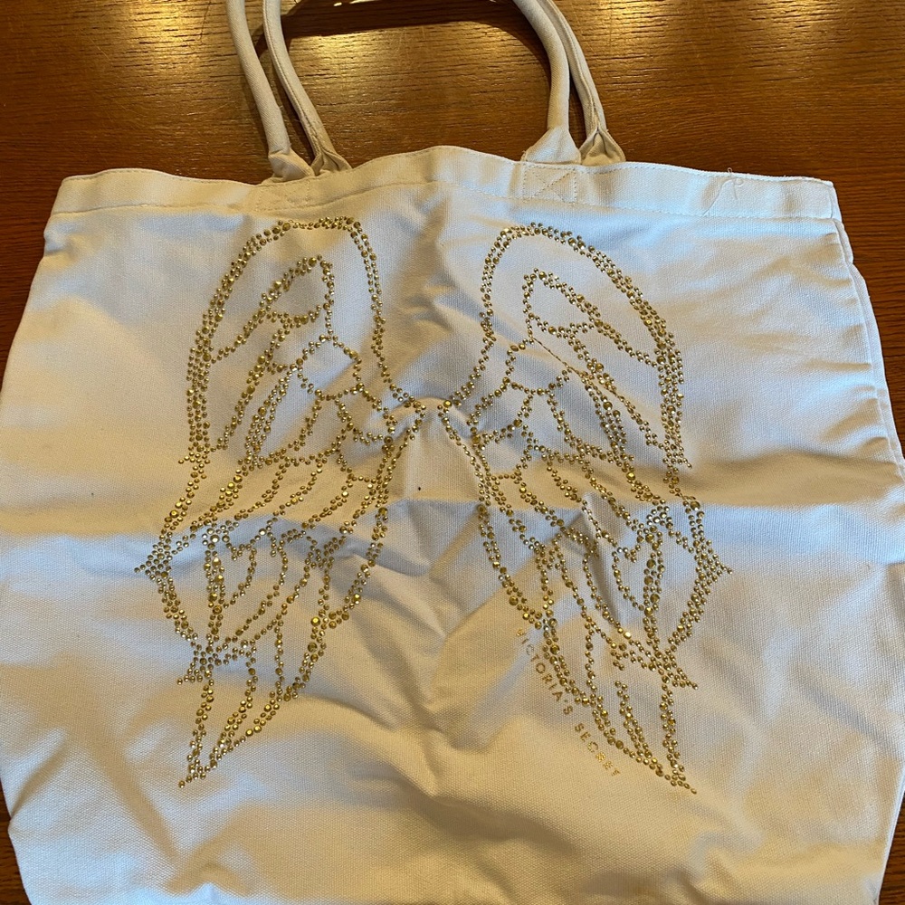 Victoria's Secret Cream Tote with Gold Wing Stud Design